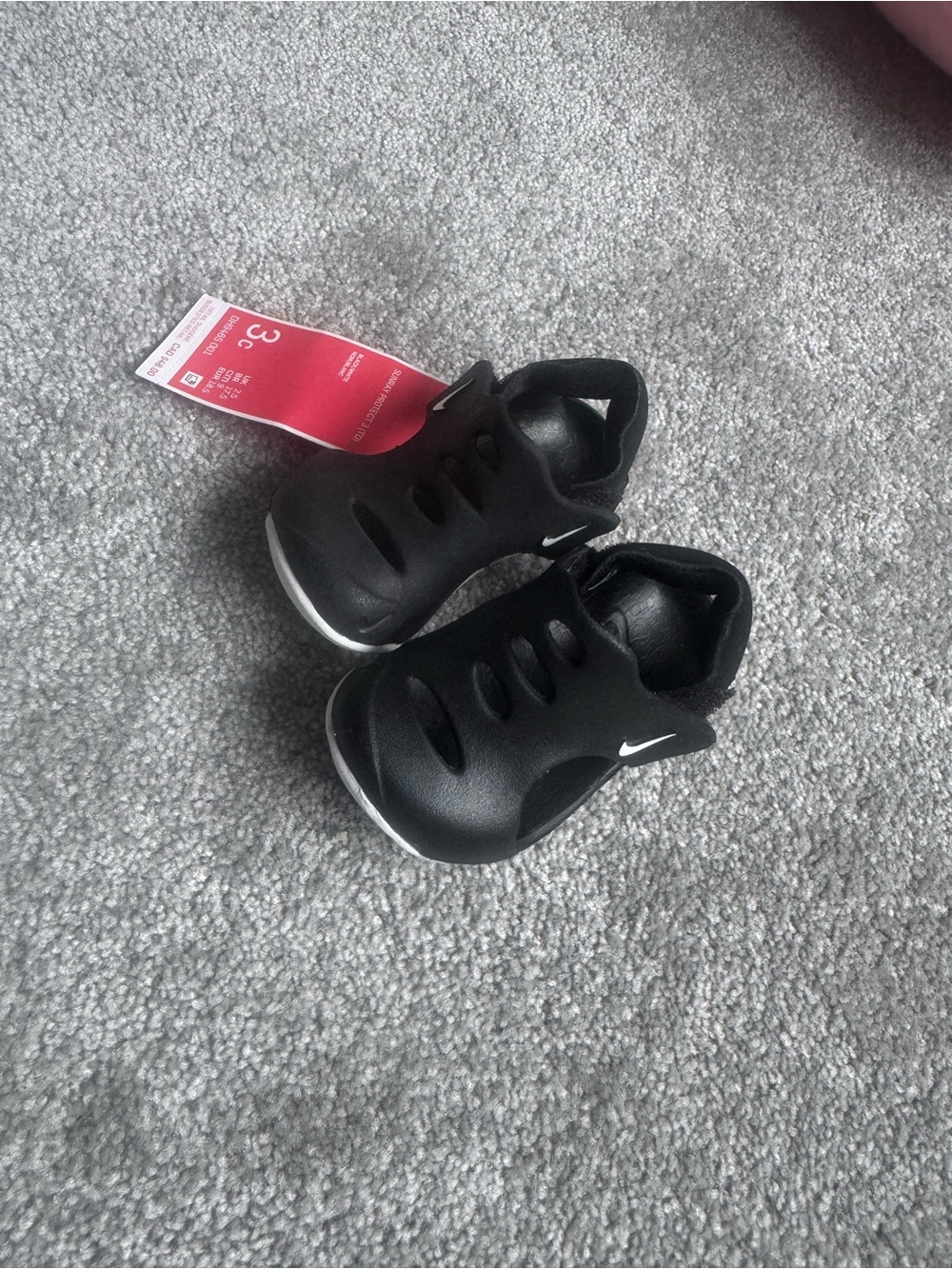 Nike Kids Black and White Slip-On Sandals
